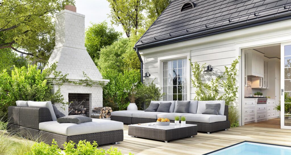 Cozy patio area with garden furniture, swimming pool and outdoor