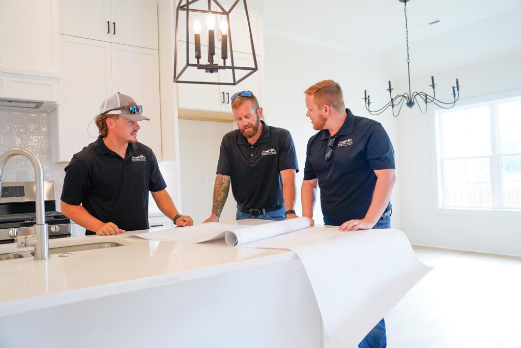 TBG Homes Builders Reviewing Plans