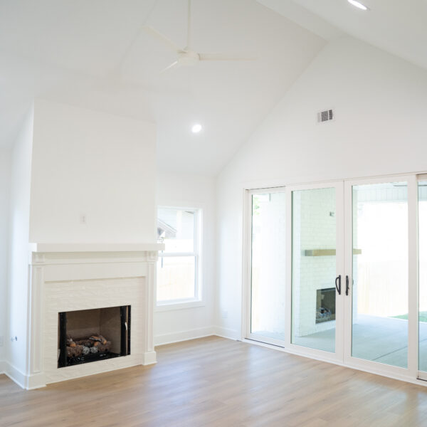 Lot 116 | Vaulted Ceiling Living Space with Brick Fireplace