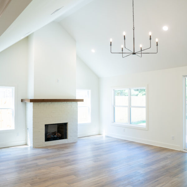 Lot 112 | Vaulted Living Room with Brick Fireplace