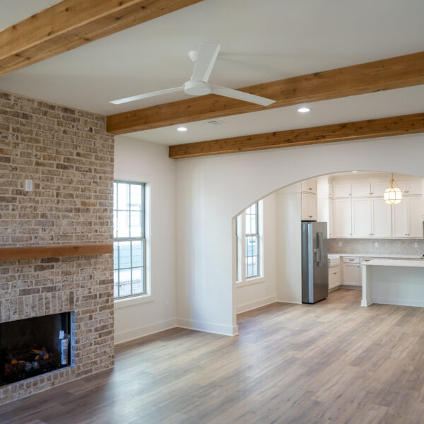 Lot 9 | Cedar Beam Ceiling with Full Brick Fireplace