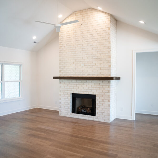 Lot 11 – Vaulted Ceiling with Brick Fireplace